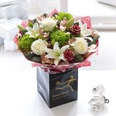 Christmas Rose & Lily hand-tied from £49.99