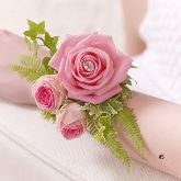 Pink Rose & Fern Wrist Corsage From £19.99