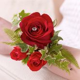 Red Rose & Fern Wrist Corsage From £19.99