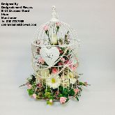 Birdcage with Flowers Inside