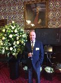 Neil Whittaker with glass Champagne in the Jubliee Room Palace westminster