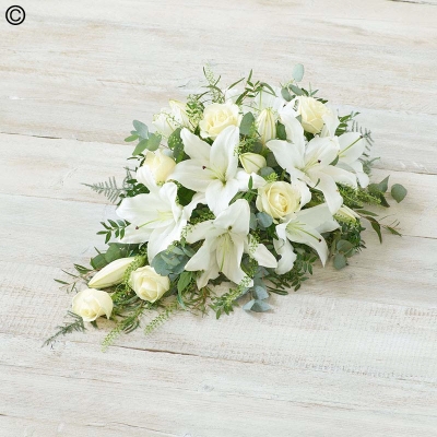 Rose & Lily Spray White delivered for funeral in the Greater Manchester and salford area