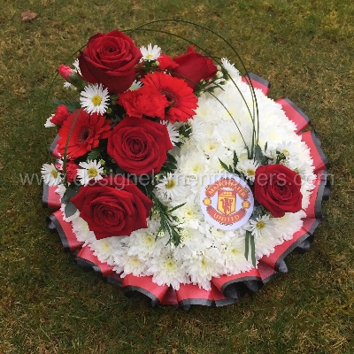 Manchester United Red and White Massed Posy Pad (Size 30cm )  hand delivered in Manchester , Salford , eccles , Winton , Peel Green , Irlam , Cadishead , Urmston , Flixton , Old Trafford 