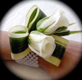 WHITE ROSE AND SANDRIANA WRIST CORSAGE hand delivered in our local area like Greater Manchester , Irlam , Cadishead , Salford , Eccles , Monton , Peel Green , Urmston, Stretford, Old Trafford 