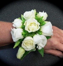 White Spray Rose & Eustoma Wrist Corsage White  hand delivered in Manchester , Salford , Eccles , Monton, Peel Green , Eccles , Irlam , Cadishead , Urmston, Old Trafford , Hulme , Broughton 