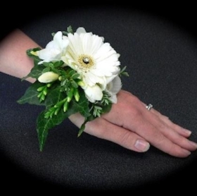 Pearl Bracelet, white Mini Gerbera and freesia.hand delivered through manchester , salford , eccles , worlsey , winton ,irlam ,cadishead , mancheser , salford 
