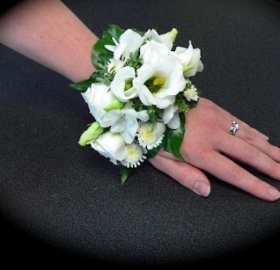 Pearl Bracelet White Lizzy and White Freesia hand delivered in irlam , cadishead , manchester , swinton , eccles , salford , greater manchester , stretford , urmston, firswood ,hulme , broughton 