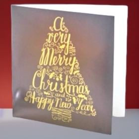 Stylish Christmas Tree Greetings Card and Envelope can bee added to your flowers to make gift extra special 