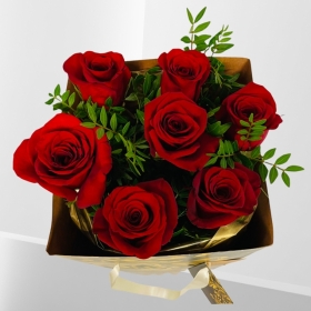 Baroque Seven Long Stemmed Red Freedom Roses in Gift Bag 